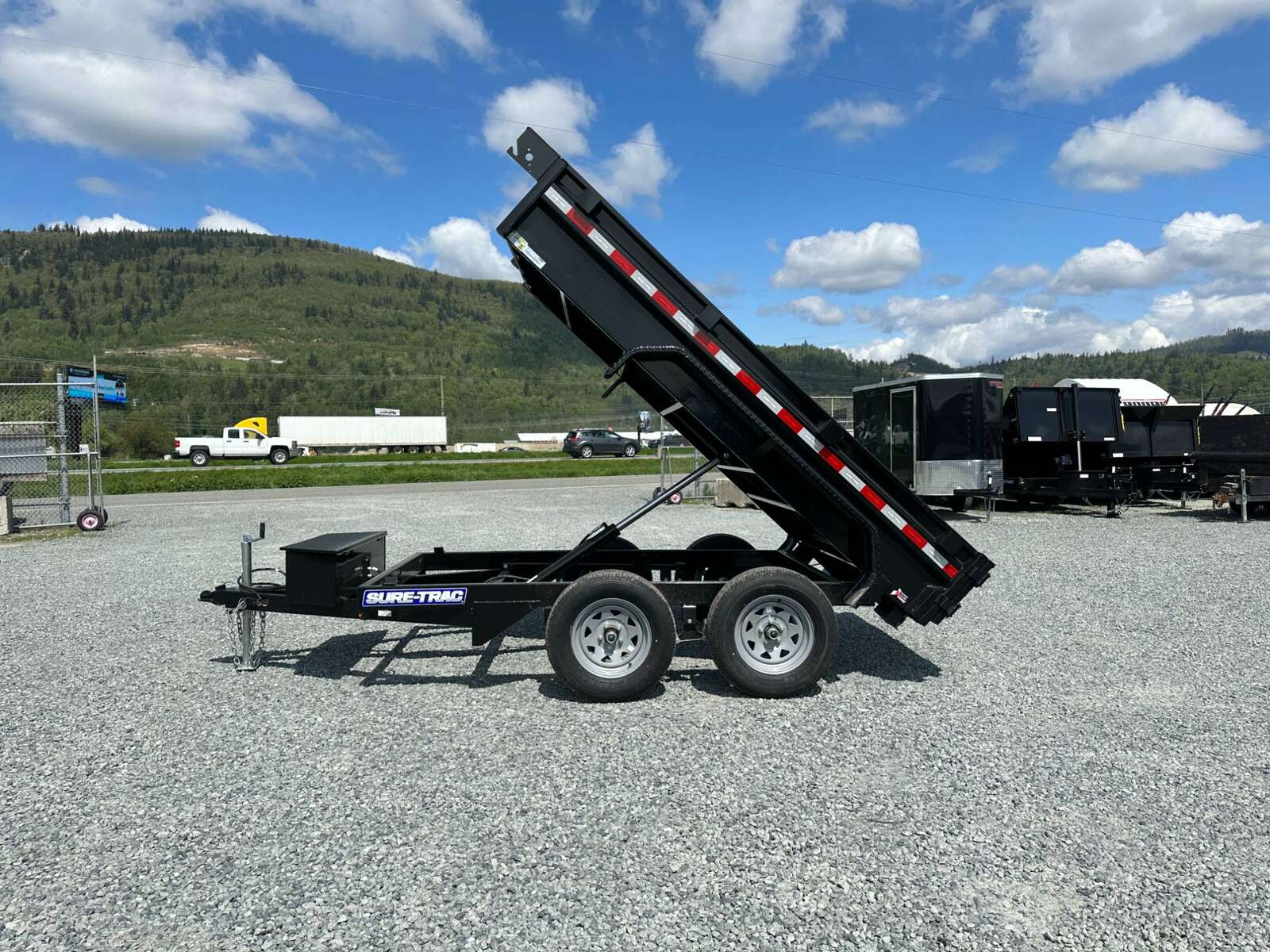 Photo of 2024 Suretrac 5x10 Dump Trailer 7000lb GVW Barn Doors