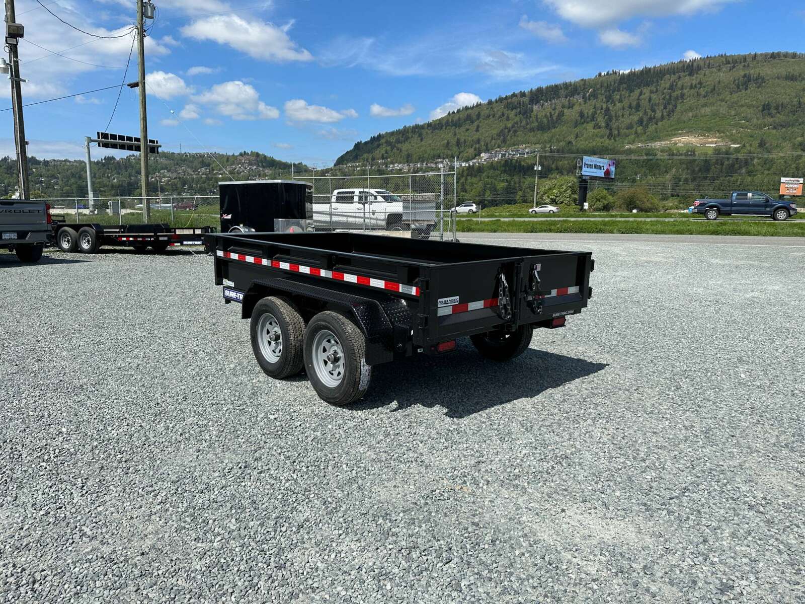 Photo of 2024 Suretrac 5x10 Dump Trailer 7000lb GVW Barn Doors