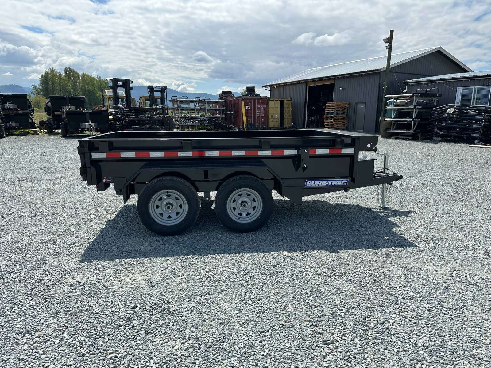 Photo of 2024 Suretrac 5x10 Dump Trailer 7000lb GVW Barn Doors