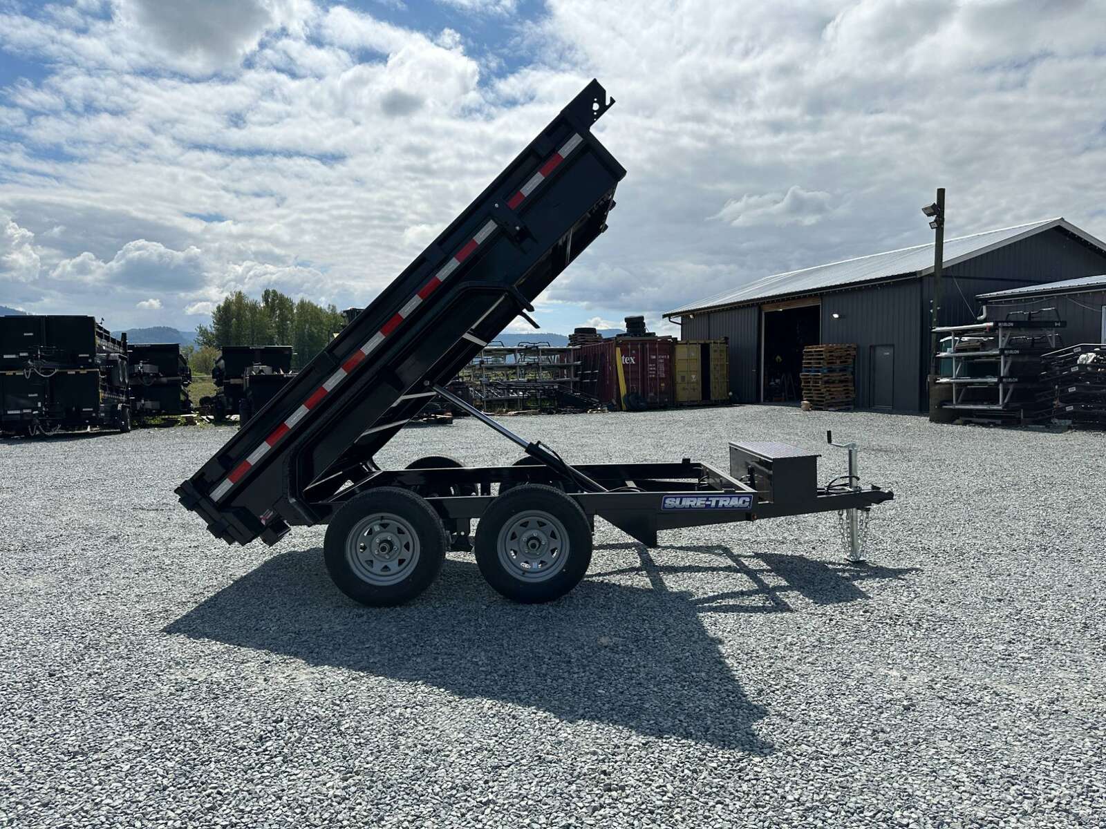 Photo of 2024 Suretrac 5x10 Dump Trailer 7000lb GVW Barn Doors