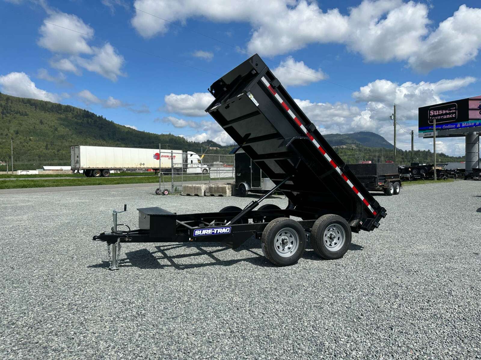 Photo of 2024 Suretrac 5x10 Dump Trailer 7000lb GVW Barn Doors