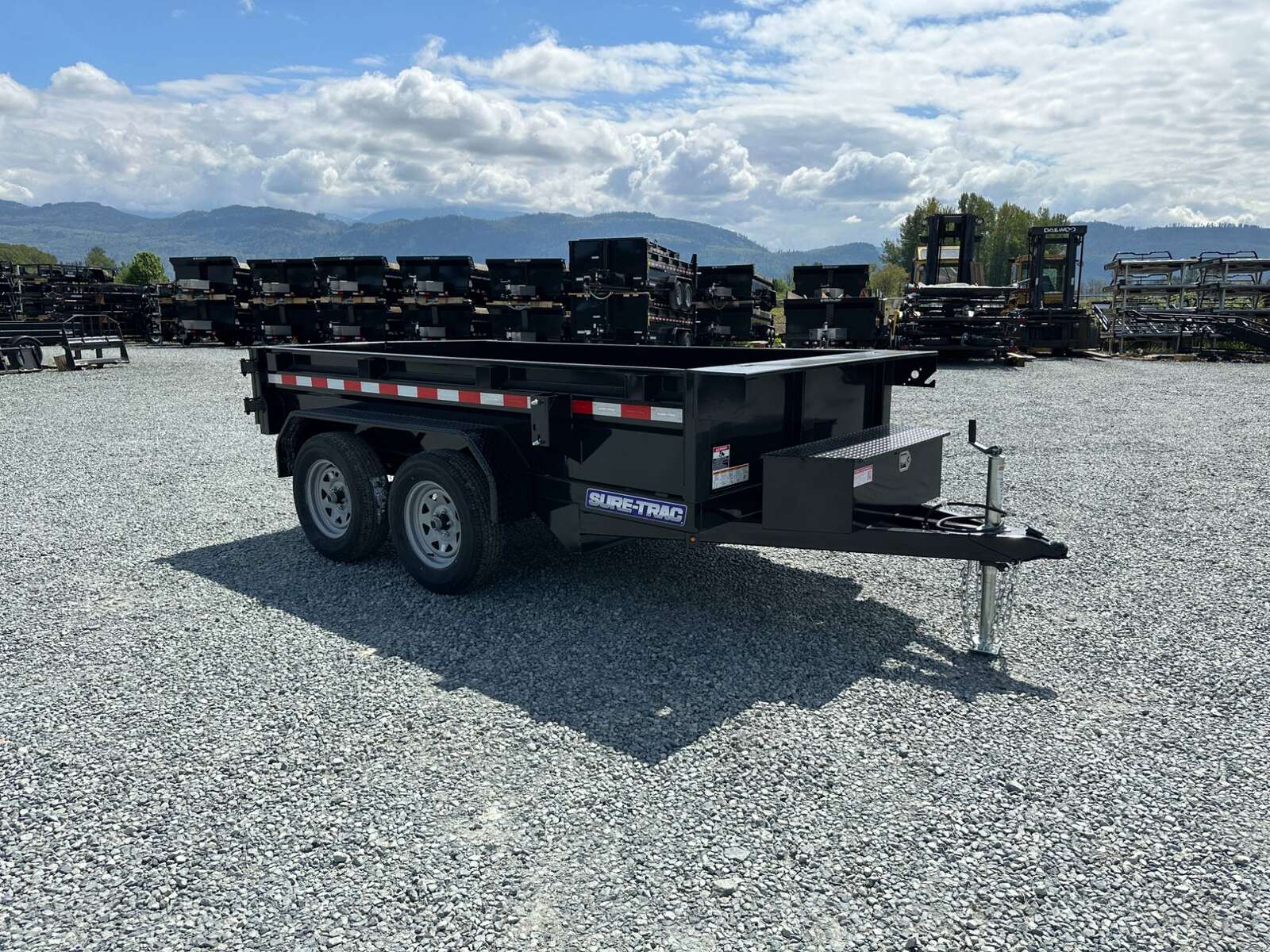 Photo of 2024 Suretrac 5x10 Dump Trailer 7000lb GVW Barn Doors