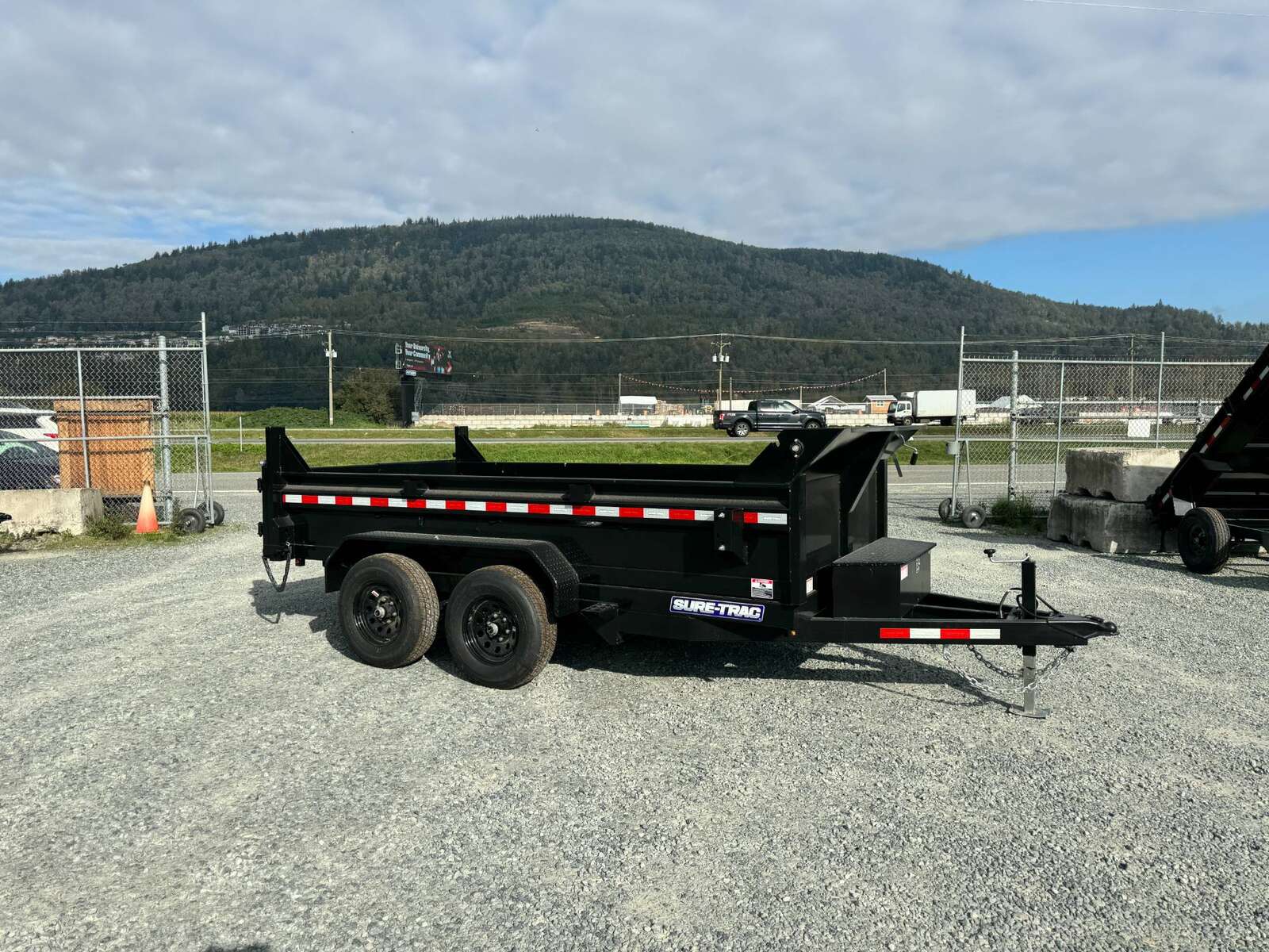 Photo of 2025 SURETRAC 6X12 DUMP TRAILER 9,900LBS GVW W/RAMPS & TARP