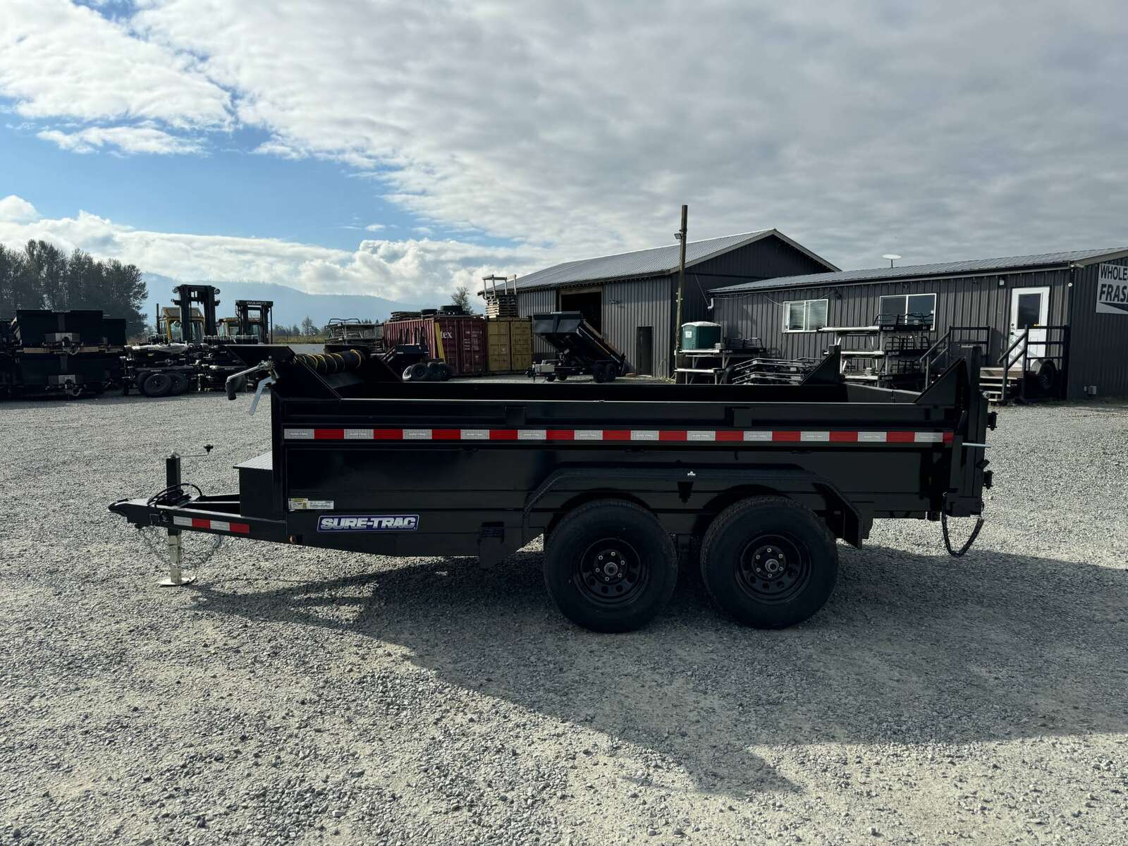 Photo of 2025 SURETRAC 6X12 DUMP TRAILER 9,900LBS GVW W/RAMPS & TARP