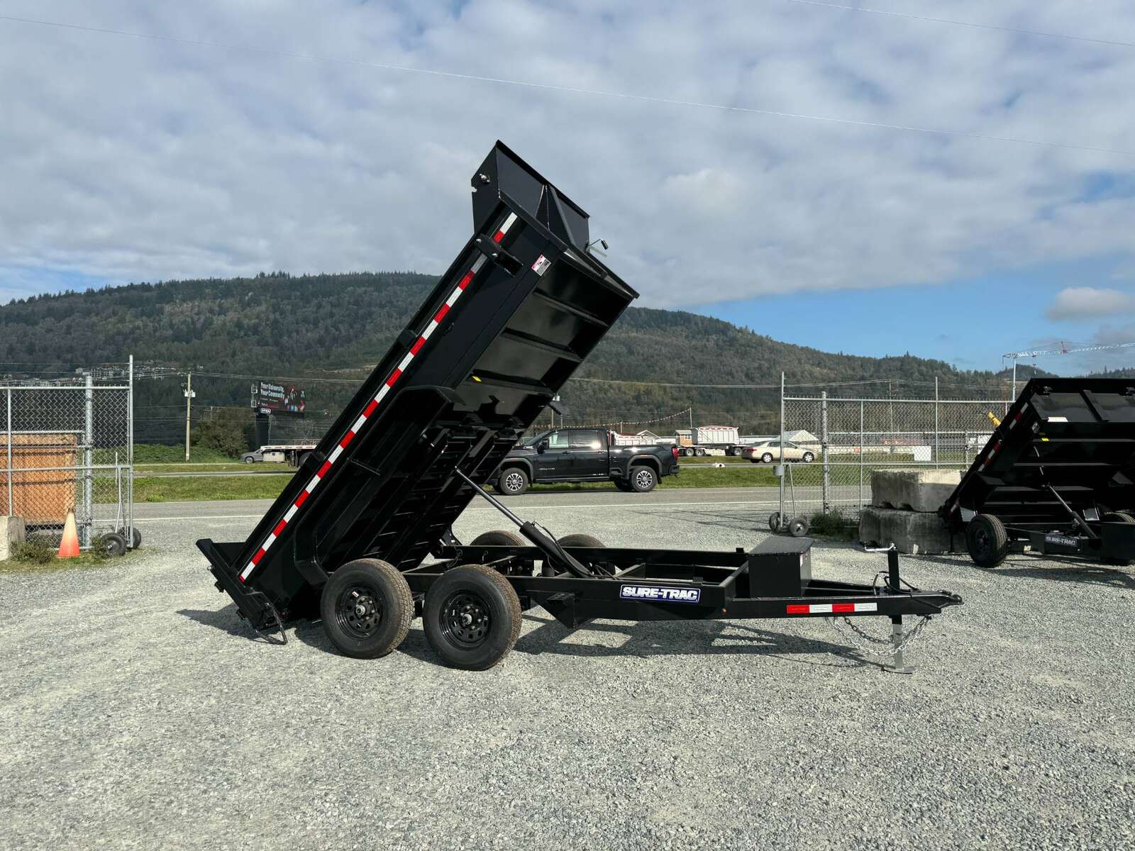 Photo of 2025 SURETRAC 6X12 DUMP TRAILER 9,900LBS GVW W/RAMPS & TARP