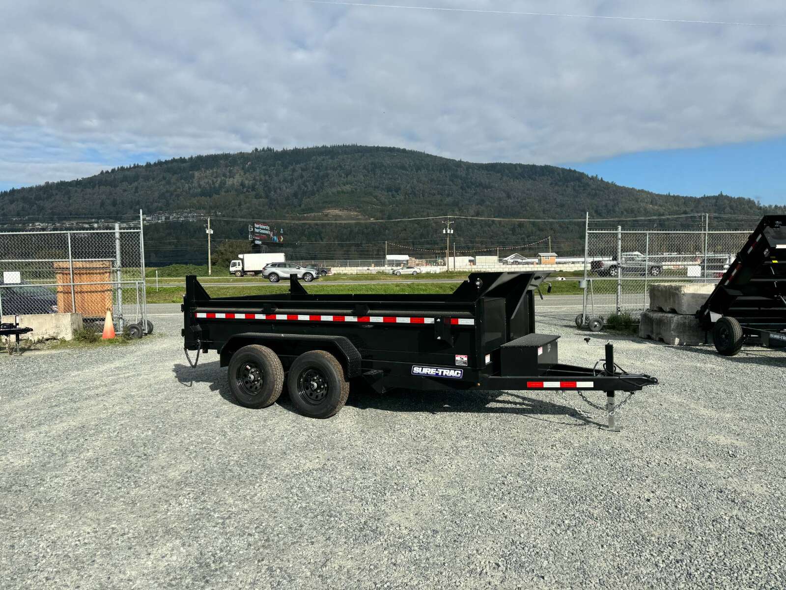 Photo of 2025 SURETRAC 6X12 DUMP TRAILER 9,900LBS GVW W/RAMPS & TARP